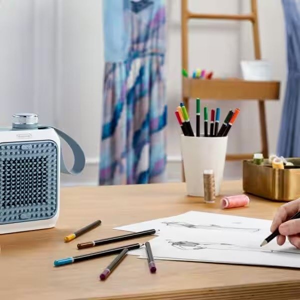⁦دفاية بمروحة ديلونجي Capsule Desk Ceramic، بقوة 360 وات، ازرق فاتح - HFX10B03.LB⁩ - الصورة ⁦5⁩