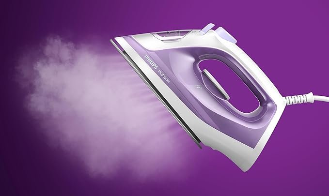 مكواة بخار فيليبس سلسلة 1000 - 1800 واط، تعزيز بخار 90 غرام، قاعدة مكواة غير لاصقة، سعة ماء 250 مل، تنظيف الكلس، لون بنفسجي - DST1020/30 - الصورة 5