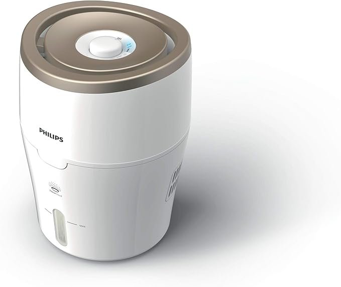 HU4811 مرطب هواء فيليبس سلسلة ٢٠٠٠ - غرف تصل مساحتها إلى ٣٥ مترًا مربعًا، معدل ترطيب ٢٥٠ مل/ساعة، لون أبيض وشامبانيا - HU4811/90